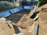 K.Wind Pools 3 installing metal frame for Lorrie and Deans pool