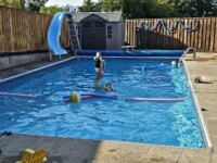 K.Wind Pools Graham family in the pool